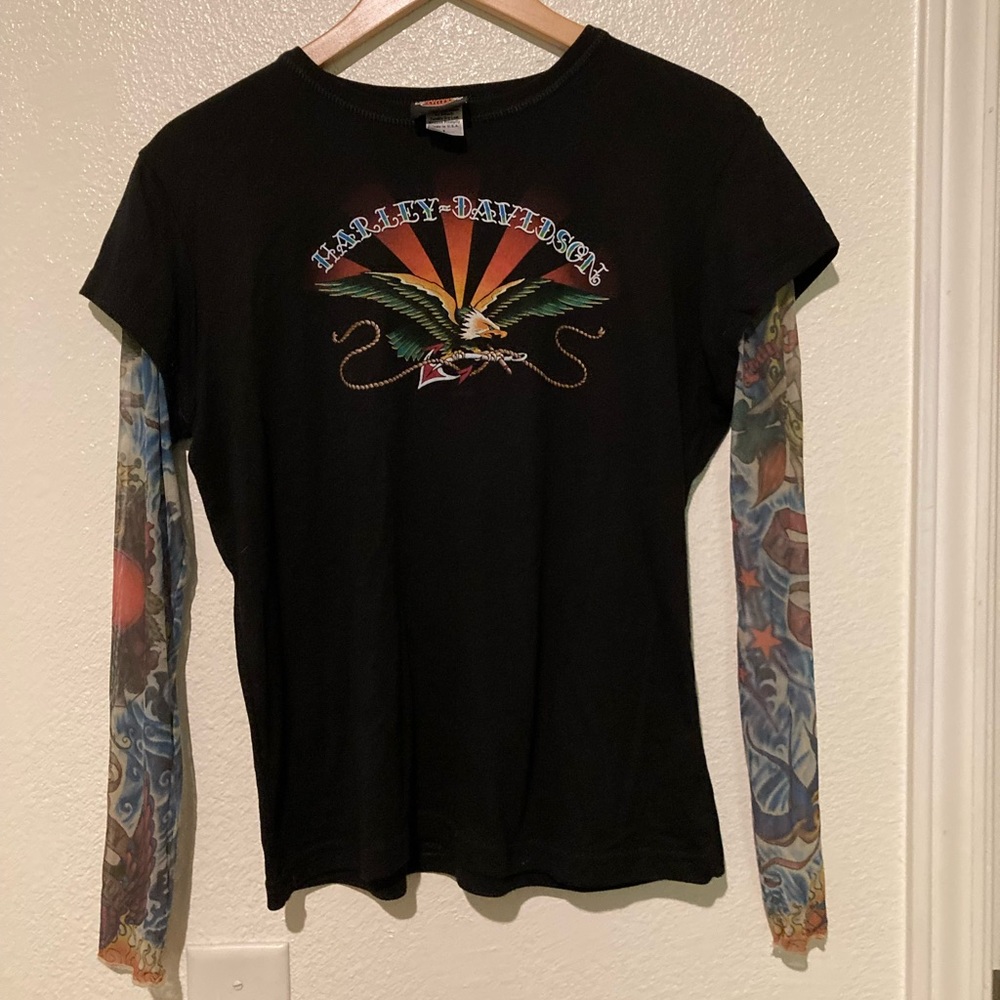 Harley Davidson t-shirt with tattoo sleeves.